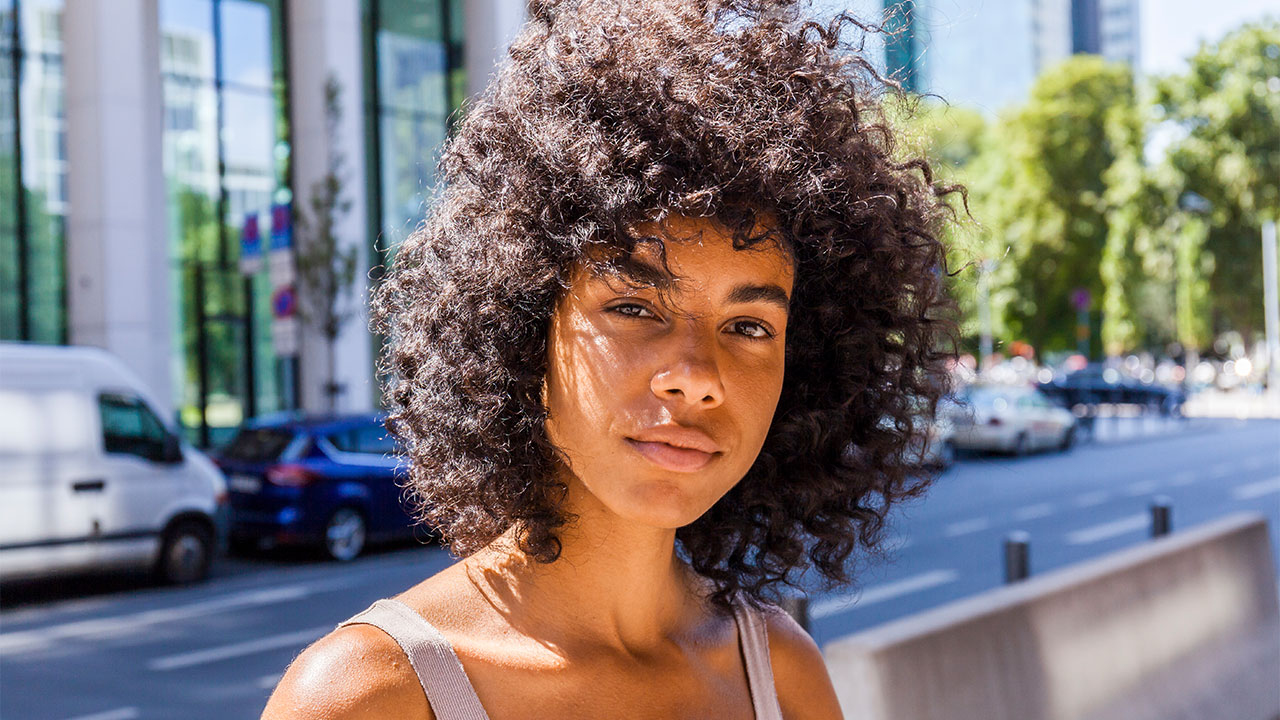 10 Anti-Frizz Products Worth Stocking Up on For Summer