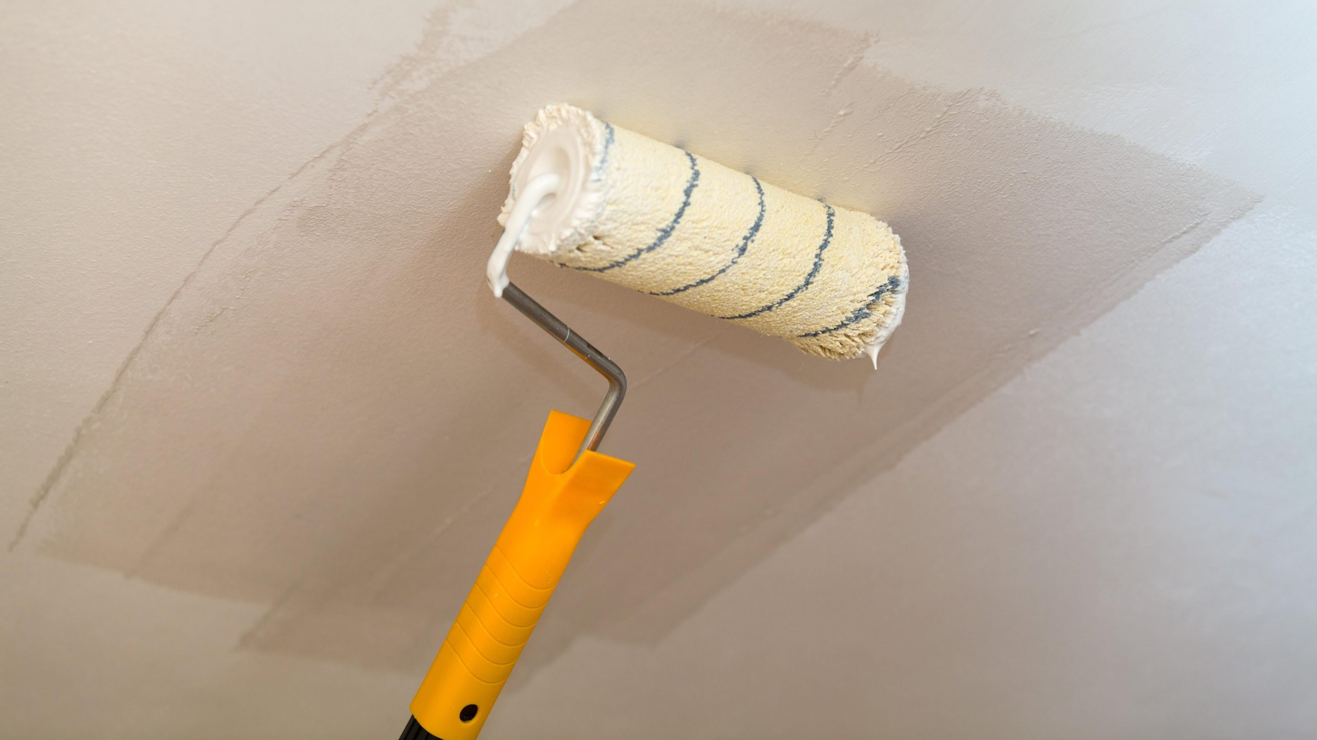 How to Paint a Ceiling Without Getting Paint Everywhere, Including on Yourself